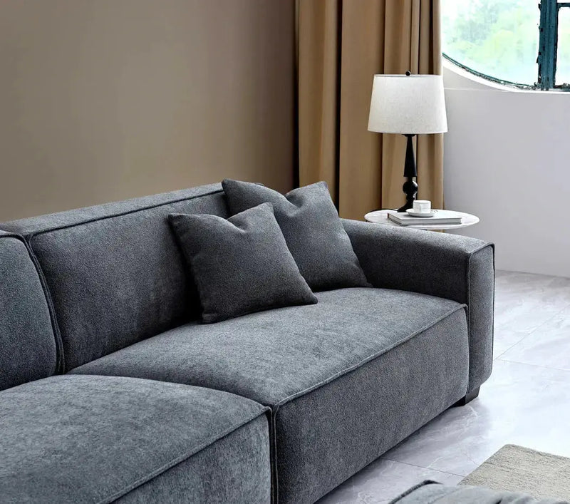 Aluxo Dakota 4 seater with Chaise in Charcoal Boucle